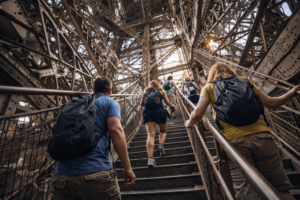 The people climbing the stairs of Eiffel Tower 